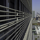 Illustration for article titled The Lattice of Tubes Covering This Building Are a Natural AC System